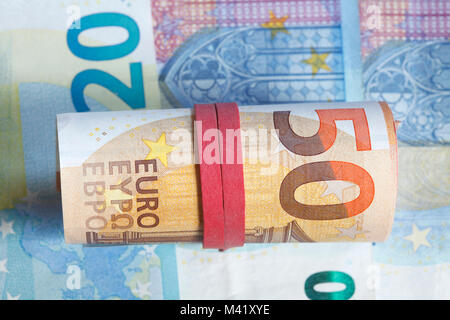 Monetary role, euronotes with elastic band Tied together Stock Photo