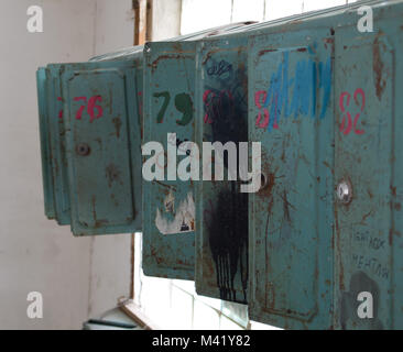 Old broken mailboxes Stock Photo