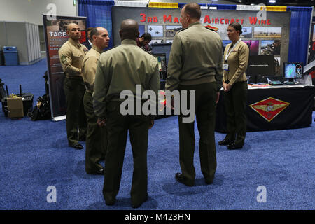 Maj. Gen. Mark R. Wise, 3rd Marine Aircraft Wing (MAW) commanding general, visits the 3rd MAW display at WEST 2018 in San Diego, Feb. 8. WEST 2018 allows innovators, industry leaders and the military the opportunity to network, learn and work together with the goal of meeting and overcoming challenges facing today's Sea Services. (U.S. Marine Corps photo by Sgt. David Bickel/Released) Stock Photo