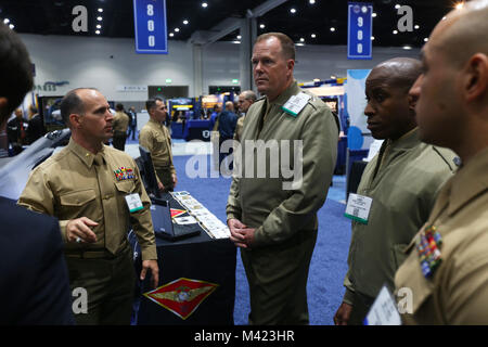 Maj. Gen. Mark R. Wise, 3rd Marine Aircraft Wing (MAW) commanding general, visits the 3rd MAW display at WEST 2018 in San Diego, Feb. 8. WEST 2018 allows innovators, industry leaders and the military the opportunity to network, learn and work together with the goal of meeting and overcoming challenges facing today's Sea Services. (U.S. Marine Corps photo by Sgt. David Bickel/Released) Stock Photo