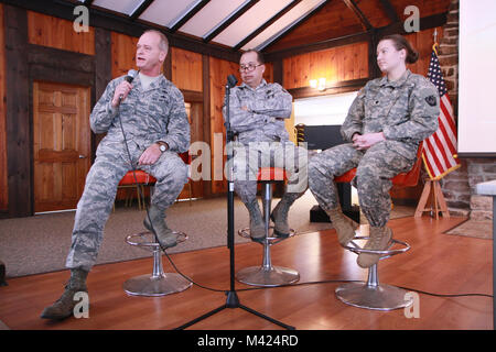 Master Sgt. Chris Botzum and Master Sgt. George Roach of the 111th Attack Wing, and Spc. Anna Churco with the 109th Mobile Public Affairs Detachment, 213th Regional Support Group, all public affairs professionals with the Pennsylvania National Guard, participated in a panel discussion of their experiences on state active duty during relief efforts for regions affected by Hurricanes Harvey, Irma, and Maria during fall of 2017 during Pennsylvania's Joint Public Affairs Workshop Feb. 10 at Fort Indiantown Gap. (U.S. Army National Guard photo by Spc. Hannah Baker) Stock Photo