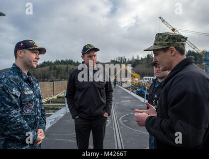 BANGOR, Wash. (Feb. 9, 2018) - Cmdr. Jeffery Yackeren, commanding officer Ohio-class ballistic missile submarine USS Alabama (SSBN 731), gives tour to Deputy Secretary of Defense Patrick Shanahan and facilities assigned to Commander Submarine Group 9 at Naval Base Kitsap-Bangor to see the operations of one leg of the nuclear triad. (U.S. Navy photo by Mass Communication Specialist 2nd Class Nancy C. diBenedetto/Released) Stock Photo
