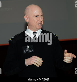 Col. Andrew Baxter, Regional Nurse Executive Officer, delivers remarks at the Army Nurse Corps, 117th Birthday celebration, February 02, 2018, Landstuhl Regional Medical Center, Landstuhl, Germany. (U.S. Army photo by Visual Information Specialist Elisabeth Paque/Released) Stock Photo