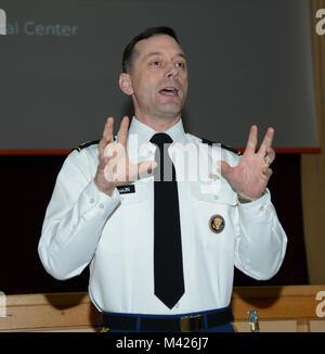 Col. Timothy L. Hudson, Commander, Landstuhl Regional Medical Center, delivers remarks at the Army Nurse Corps, 117th Birthday celebration, February 02, 2018, Landstuhl Regional Medical Center, Landstuhl, Germany. (U.S. Army photo by Visual Information Specialist Elisabeth Paque/Released) Stock Photo