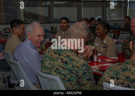 The Honorable Richard V. Spencer, Secretary of the Navy has lunch with Marines and sailors at Dunham Hall aboard the Marine Corps Air Ground Combat Center, Twentynine Palms, Calif., Feb. 2, 2018. Secretary Spencer visited the Combat Center during his West Coast installation tour. (U.S. Marine Corps photo by Pfc. Rachel K. Porter) Stock Photo