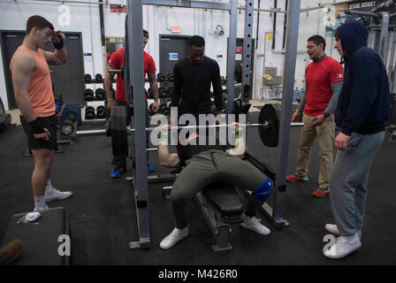 180202-N-GP524-0190  NAVAL SUPPORT FACILITY DEVESELU, Romania (Feb. 2, 2018) Sailors assigned to Naval Support Facility (NSF) Deveselu compete in a 1000-pound Weightlifting Challenge hosted by the command Morale, Welfare and Recreation team. NSF Deveselu and Aegis Ashore Missile Defense System Romania are co-located with the Romanian 99th Military Base and play a key role in ballistic missile defense in Eastern Europe. (U.S. Navy photo by Mass Communication Specialist 2nd Class Bill Dodge/Released) Stock Photo