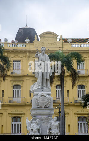 Havana Cuba - 26 January 2018:  Statue of Jose Marti in Parque Central Havana with Hotel Inglaterra in background Stock Photo