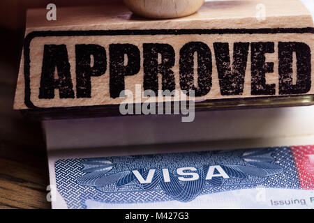 Close-up Photo Of Approved Stamp On Visa Stock Photo