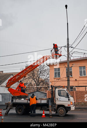 emergency crew on the power line Stock Photo