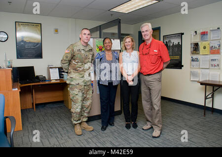 FORT SHAFTER — From left to right: Sgt. Maj. Jason Schmidt, command sergeant major, Installation Management Command-Pacific, attended a meeting with Herd at the Transition Assistance Program Center, Janice Crawley, financial readiness specialist, Soldier for Life-Transition Assistance Program, and Sabrina Newman, transition services specialist, Military Personnel Division (DHR), U.S. Army Garrison-Hawaii, and Ret. Col. Walter M. Herd, Army Transition Division director at the Human Resources Command Center of Excellence, pose for a Stock Photo