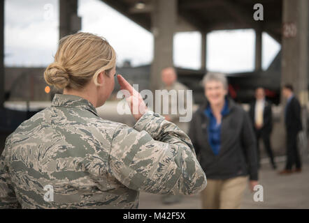U.S. Air Force Capt. Christina Merritt, 34th Aircraft Maintenance Unit officer in charge, renders a salute to Secretary of the Air Force Heather Wilson Feb. 1, 2018, at Kadena Air Base, Japan. Wilson’s visit to Kadena marks her first tour of the installation since becoming the SECAF. (U.S. Air Force