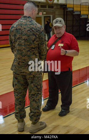 U.S. Marine Corps Maj. Gen. John K. Love, commanding general, 2nd Marine Division (2d MARDIV), left, speaks with Gunnery Sgt. Mike Piserchia (Ret.), past president of Second Marine Division Association (SMDA), on Camp Lejeune, N.C., Feb. 7, 2018. SMDA is aboard Camp Lejeune to observe and celebrate the Division’s 77th birthday. (U.S. Marine Corps Stock Photo