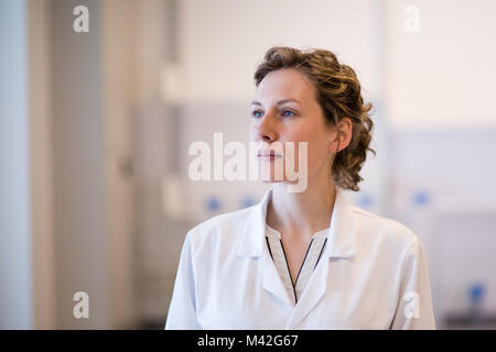 Female medical professional looking thoughtful Stock Photo