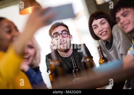 Group of friends posing for a group selfie Stock Photo