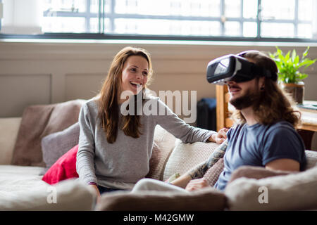 Young adult male using VR headset Stock Photo