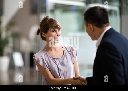 Young female businesswoman being offered a job Stock Photo