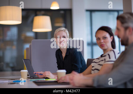 Business colleagues in a casual meeting with coffee