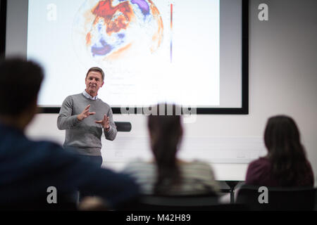 Teacher giving lecture at college Stock Photo