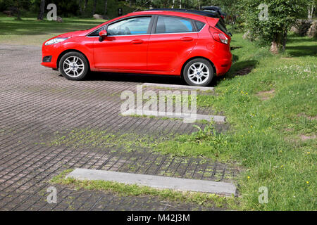 Protective rubber mesh matting in a car park Stock Photo