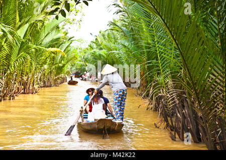 BEN TRE, VIETNAM-NOV 18, 2013: A famous tourist destination is  Ben Tre village on Nov 18, 2013. in Mekong delta , Vietnam. Mekong Delta is home of pe Stock Photo