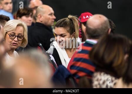 CLUJ NAPOCA, ROMANIA - FEBRUARY 10, 2018: Romanian tennis player Simona Halep (WTA ranking 2) supporting her team from the tribune during a Fed Cup ma Stock Photo