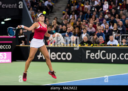 CLUJ NAPOCA, ROMANIA - FEBRUARY 10, 2018: Canadian tennis player Bianca Andreescu plays against Irina Begu from Romania during a Fed Cup match between Stock Photo