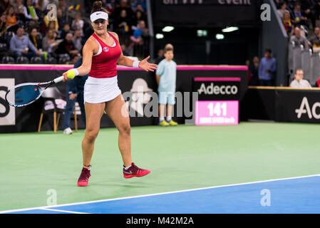 CLUJ NAPOCA, ROMANIA - FEBRUARY 10, 2018: Canadian tennis player Bianca Andreescu plays against Irina Begu from Romania during a Fed Cup match between Stock Photo