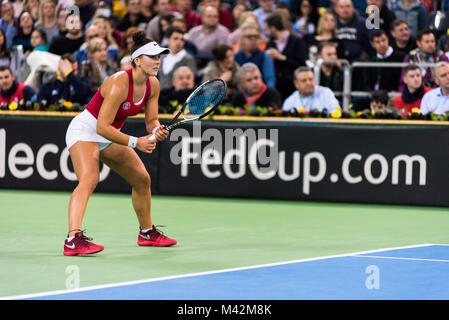 CLUJ NAPOCA, ROMANIA - FEBRUARY 10, 2018: Canadian tennis player Bianca Andreescu plays against Irina Begu from Romania during a Fed Cup match between Stock Photo