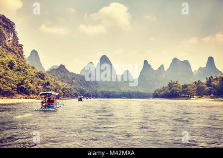 Retro toned picture of the Li River (Li Jiang) with bamboo rafts, China. Stock Photo