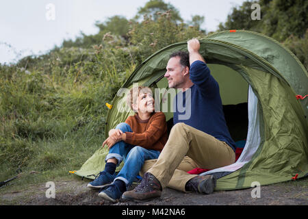 Father and Son camping together Stock Photo