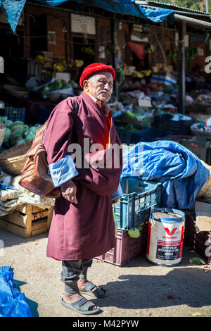 Punakha, Bhutan.  Old Man in the Lobeysa Market. Stock Photo