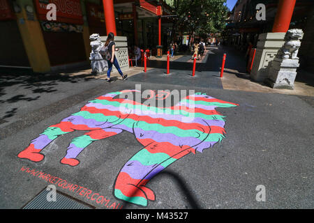 Adelaide, Australia. 14th Feb 2018. The dog which is the eleventh sign of the Chinese zodiac is painted at the entrance of Chinatown as Adelaide prepares to welcome  the Chinese Lunar New Year of the Dog  which starts on 16 February 2018.The dog is considered  loyal and honest, amiable and kind, cautious and prudent in Chinese mythology. Credit: amer ghazzal/Alamy Live News Stock Photo