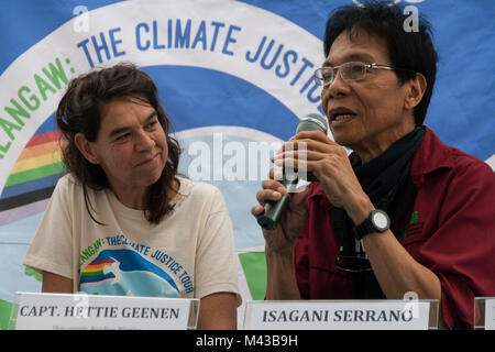 Manila, Philippines. 14th Feb, 2018. Rainbow Warrior captain Hettie Geenen looks on as Isagani Serreno, member of the Philippine Rural Reconstruction Movement, discusses sustainable development. The crew and volunteers of the Rainbow Warrior was greeted with a welcome as they visit Manila to call for Climate Justice and the protection of the environment. As part of its Asian tour, the Greenpeace ship will also dock on the Visayan island of Guimaras, and the city of Tacloban before heading to Indonesia, Singapore, Malaysia, and Thailand. Credit: J Gerard Seguia/ZUMA Wire/Alamy Live News Stock Photo