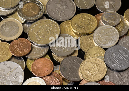 Coins from different countries. Nice money background. Stock Photo