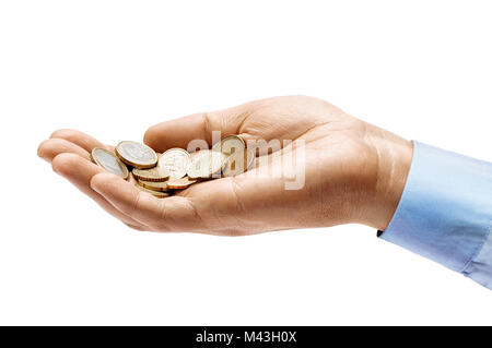 Man's hand in shirt holding a heap of different coins isolated on white background. Close up. High resolution product. Business concept Stock Photo