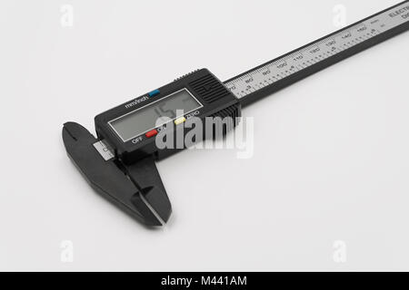 Electronic digital caliper. On a white background. Stock Photo