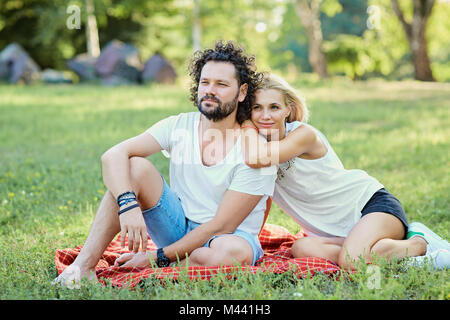 A middle-aged couple together in nature.  Stock Photo