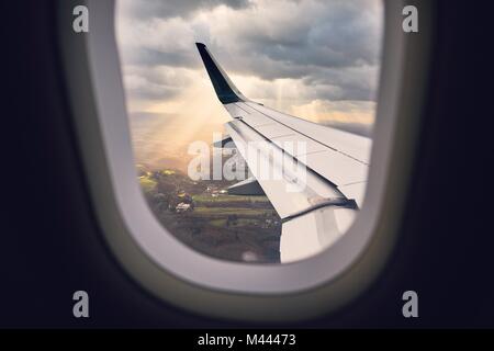 Landing during wind storm. View from the airplane window. Stock Photo