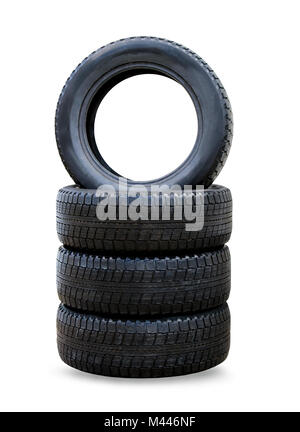 Stack of four wheel new black winter tyres for car Stock Photo