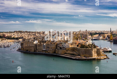 View from Valletta Upper Barrakka Gardens. Birgu or Vittoriosa (one of the Three Cities at the Grand Harbour) dominates the picture. Stock Photo