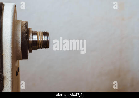 metalworking machining industry. cutting tool processing steel metal spiral pinion or worm screw shaft on lathe machine in workshop. Focus on tool. Stock Photo