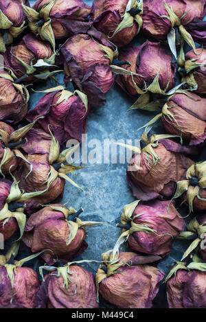Dried rose heads arrangement Stock Photo