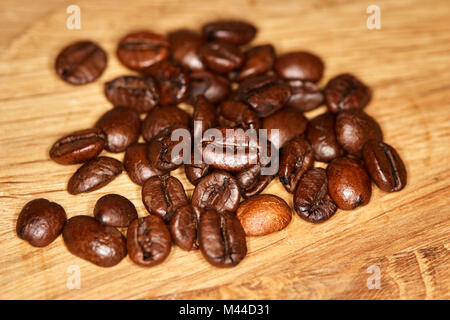 blend of arabica and robusta shiny roasted coffee beans Stock Photo