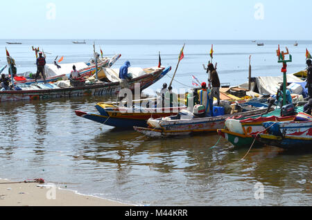 Artisanal wooden fishing boats (pirogues) in the Petite Côte of Senegal, Western Africa Stock Photo