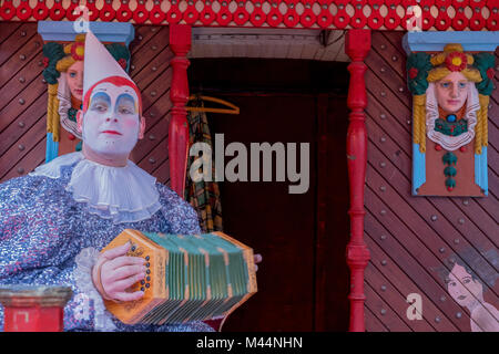 VENICE, ITALY - FEBRUARY 09: A man wearing a carnival costume poses during a portrait session on the stage of the circus structure built in Saint Mark Stock Photo