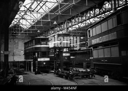 Leeds Corporation Trams 170 and 152 being repaired at possibly Swinegate Tram Shed, Leeds. Image taken in the 1950s Stock Photo