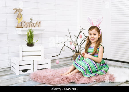 Little girl with bunny ears Stock Photo