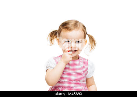 Toddler girl with magnifying glass Stock Photo