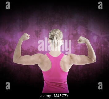 Composite image of rear view of muscular woman flexing muscles Stock Photo