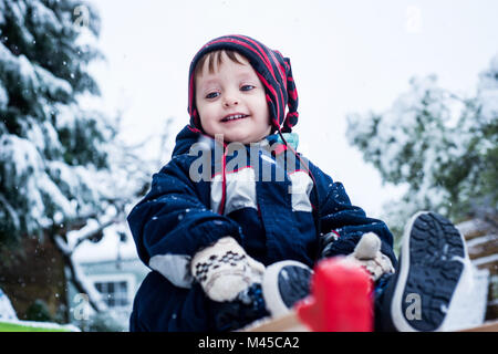 Portrait of boy wearing ski suit Stock Photo